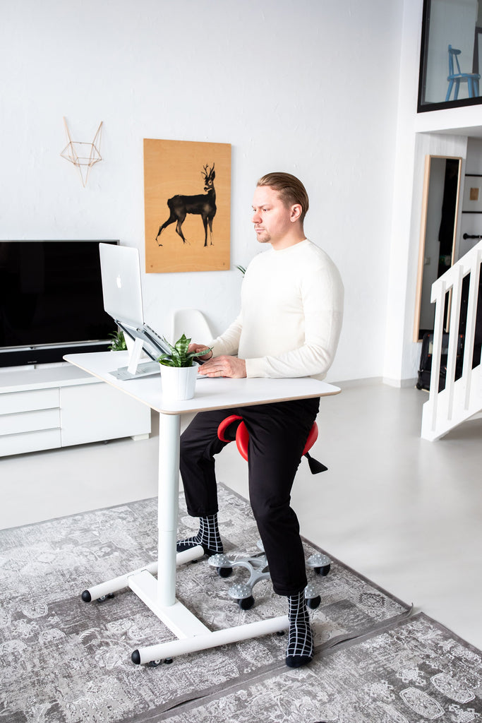 Gas spring clearance adjustable desk